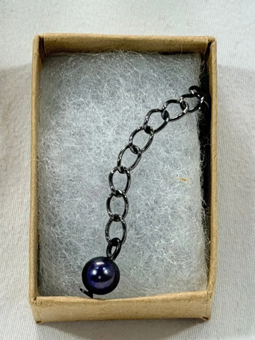 Gunmetal with black silk ribbon black pearl necklace